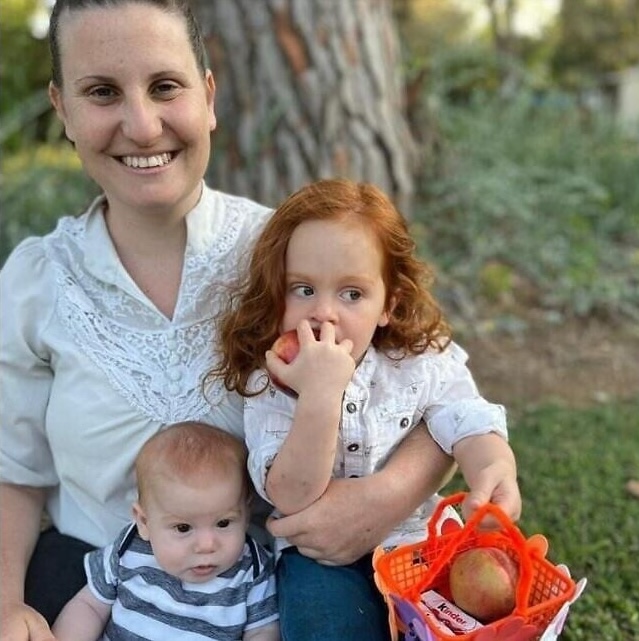 Photo of Shiri, Ariel, and Kfir Bibas